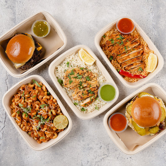 Various prepared meals in Meal Plan containers, including dishes that consists of chicken, pasta, and burgers. Healthy food for your healthy lifestyle